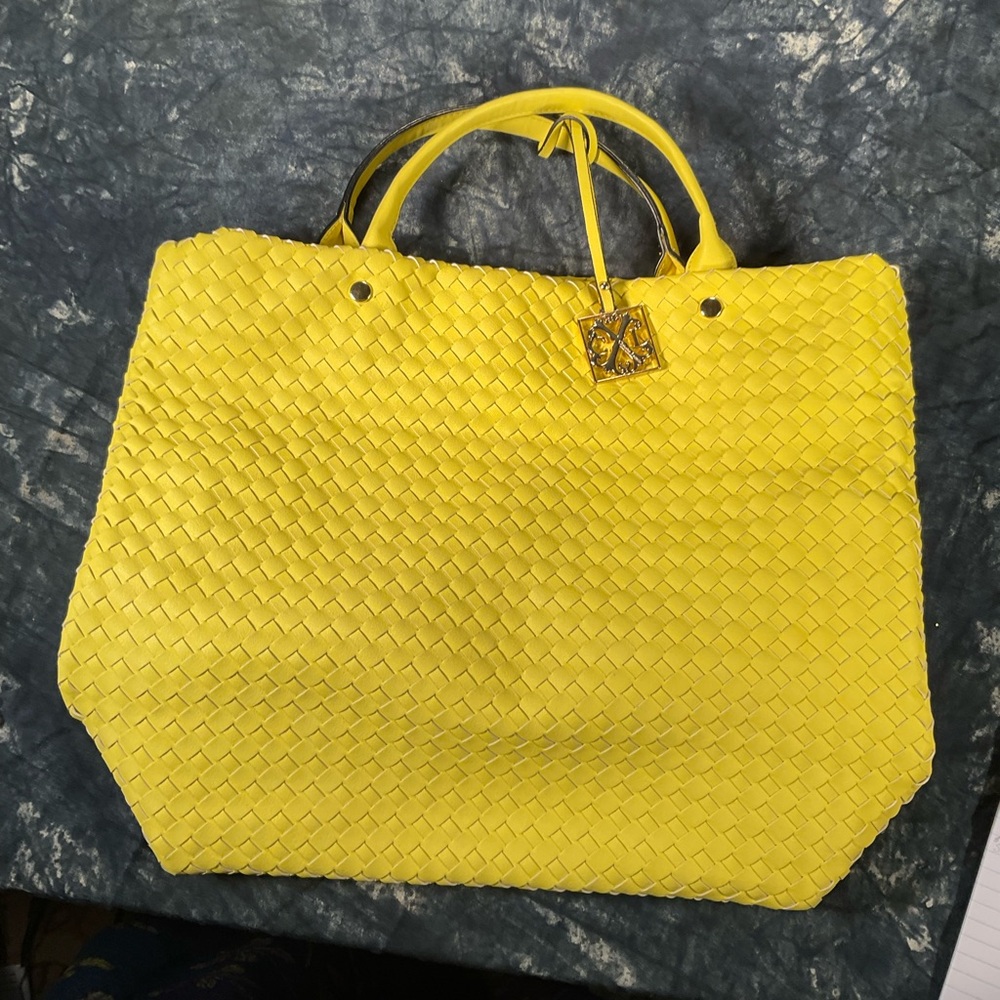 Christian Lacroix yellow purse.